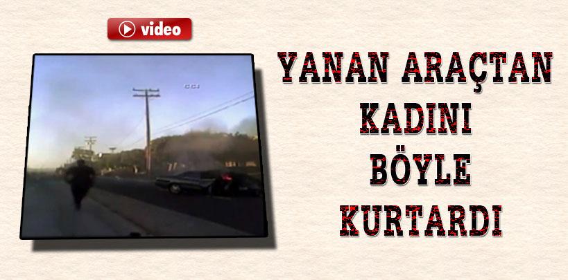 Polis memuru yanan araçtan kadını kurtardı