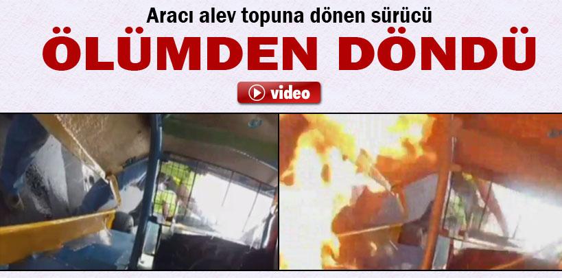 Alev topuna dönen araçtan zor kurtuldu